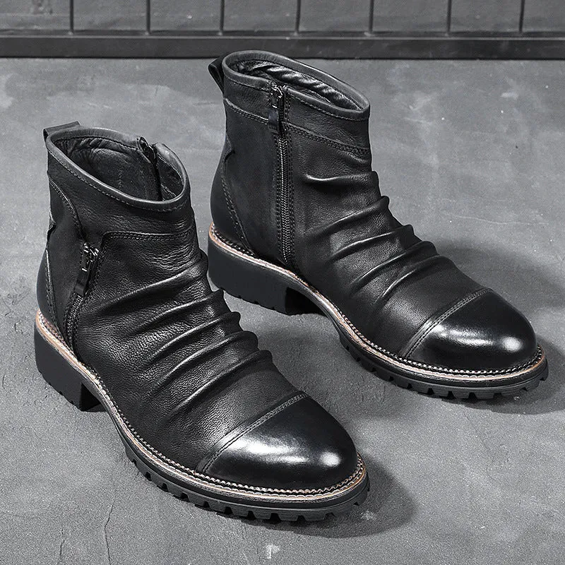 Black mid-calf cowboy boots with a side zipper, round toe, and a horseshoe heel on a plain background.