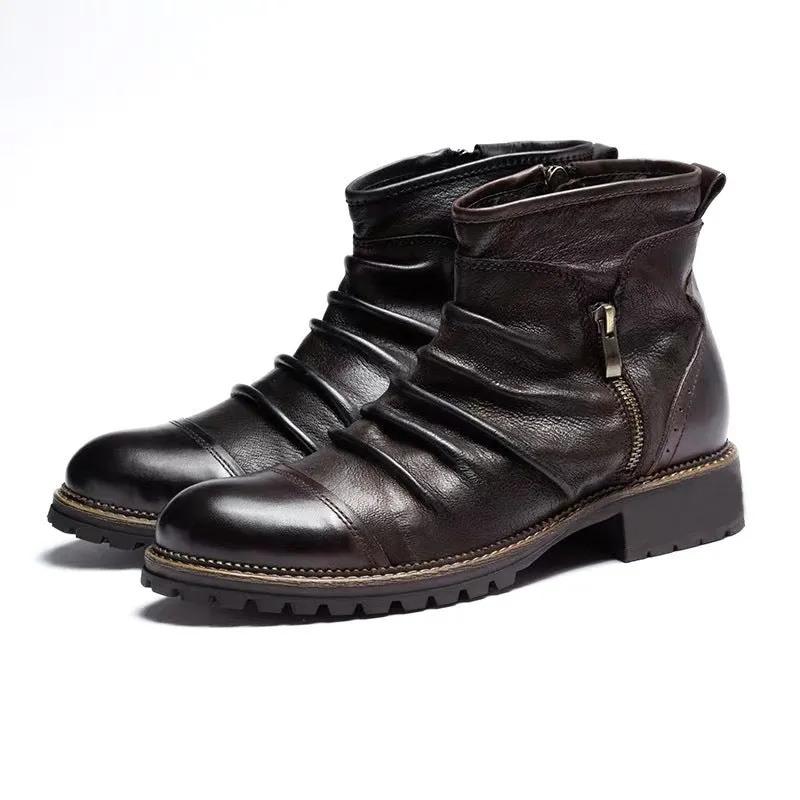 Black mid-calf cowboy boots with a side zipper, round toe, and a horseshoe heel on a plain background.