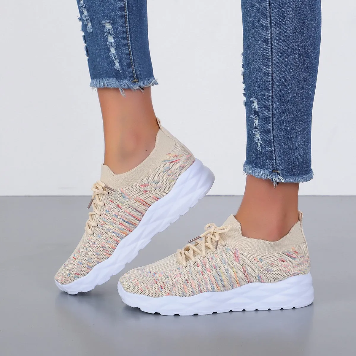 Solid colour women's flying woven pumps with mesh upper, flat heel, round toe, and cross shoulder straps