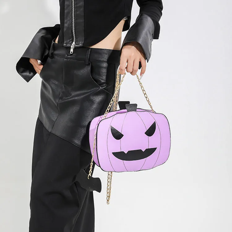 Cartoon pumpkin shoulder bag in orange with chain strap on white background