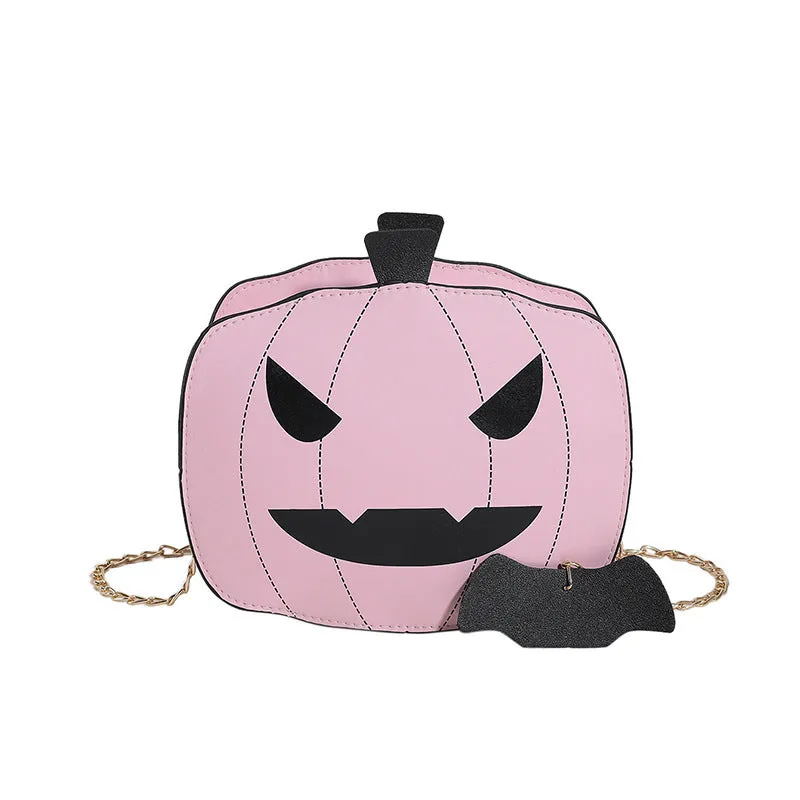 Cartoon pumpkin shoulder bag in orange with chain strap on white background