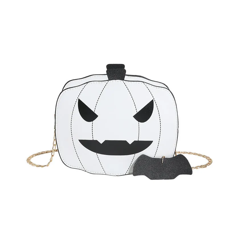 Cartoon pumpkin shoulder bag in orange with chain strap on white background