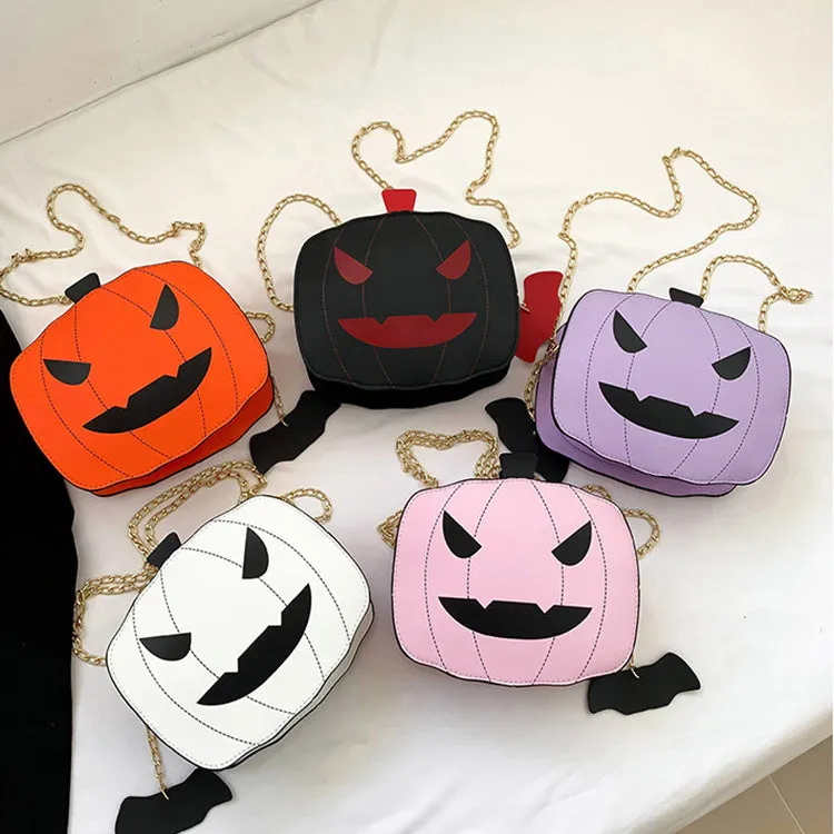 Cartoon pumpkin shoulder bag in orange with chain strap on white background