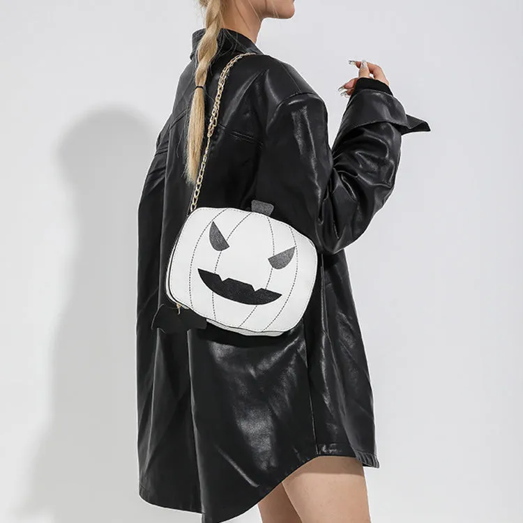 Cartoon pumpkin shoulder bag in orange with chain strap on white background