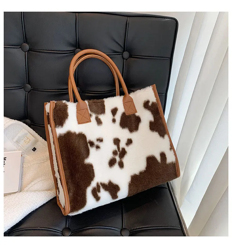 Large plush handbag with leopard print, car stitching, and magnetic buckle in Leopard Brown