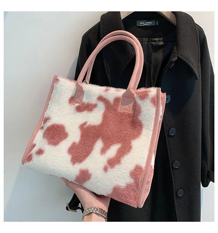 Large plush handbag with leopard print, car stitching, and magnetic buckle in Leopard Brown