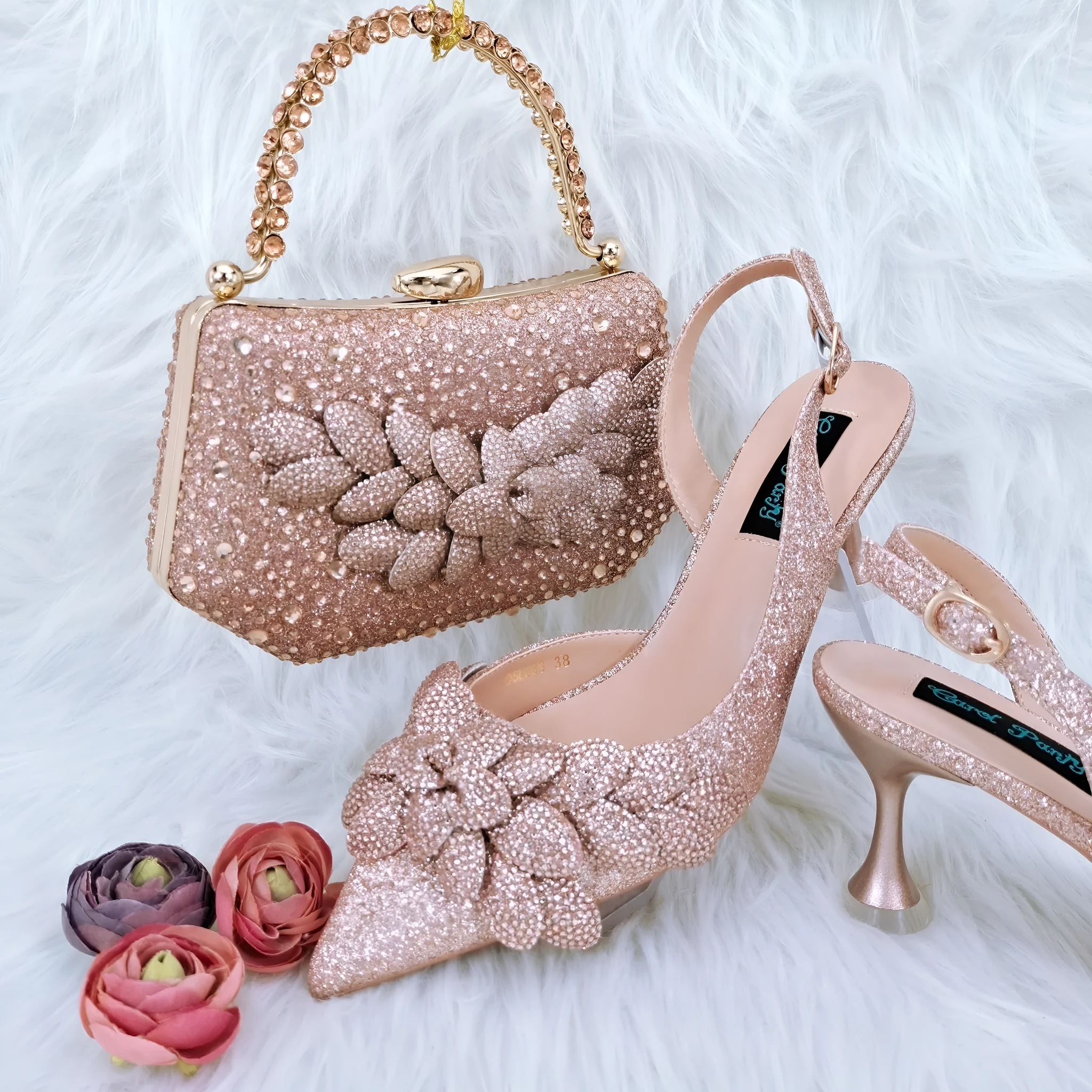 Party shoes and bag set with wine glass heel, rhinestone decoration, and buckle fastening in silver colour