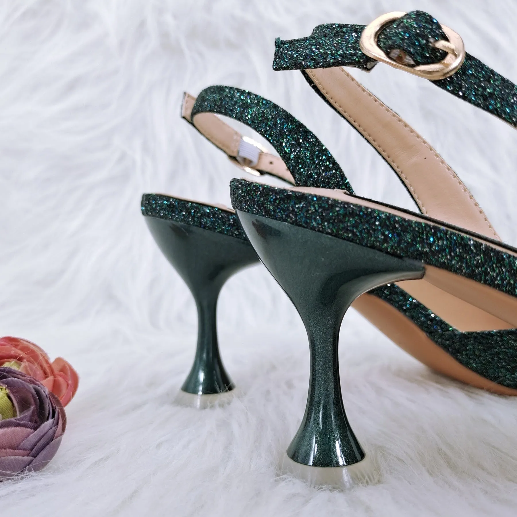 Party shoes and bag set with wine glass heel, rhinestone decoration, and buckle fastening in silver colour