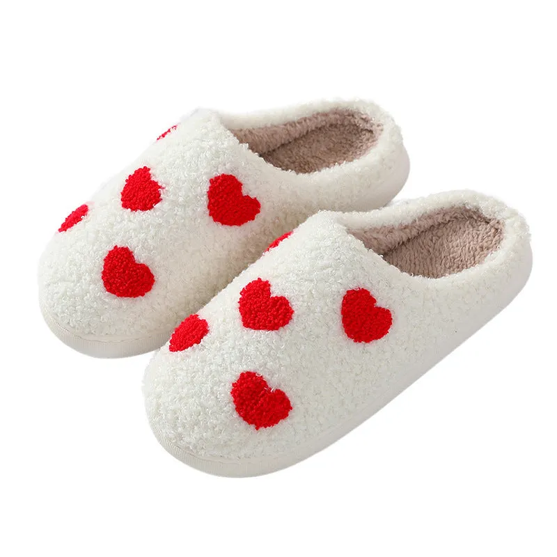 Women's plush cartoon-style home slippers with a round toe and PVC sole.