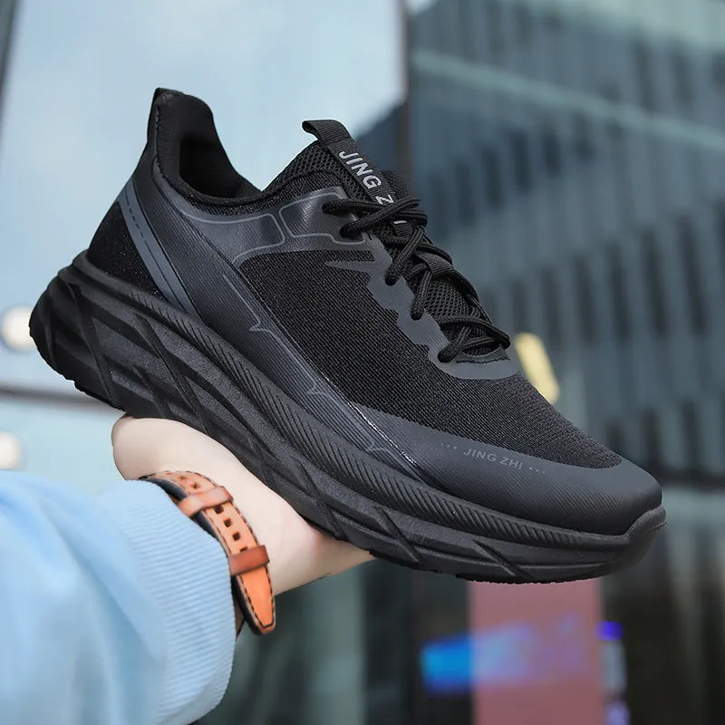 Men's black thick-soled anti-skid lace-up running sneakers with round toe and rubber sole on grey background
