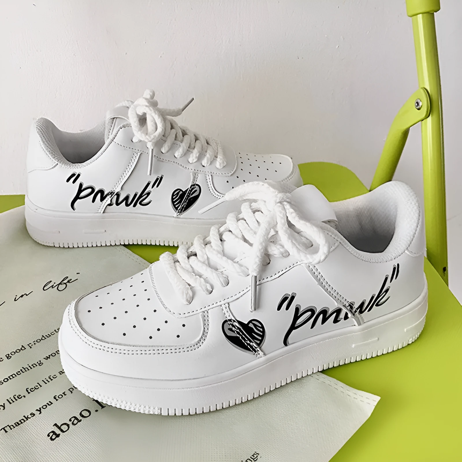 Low cut white PU sports casual shoe for men, lace-up design, solid colour, side view