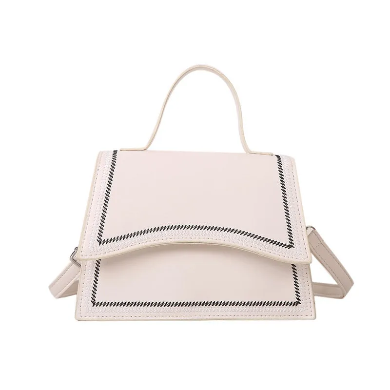 Urban simple PU crossbody flap bag with sewing line detail available in black, brown, and white