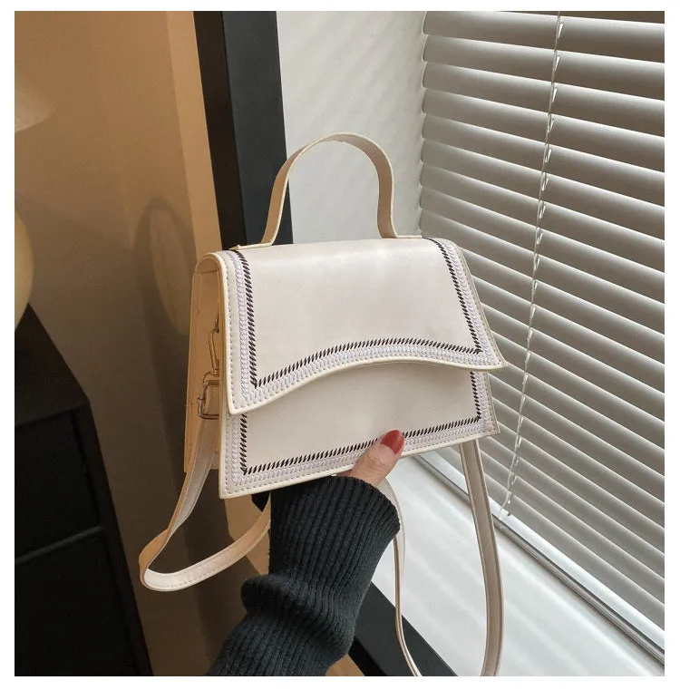 Urban simple PU crossbody flap bag with sewing line detail available in black, brown, and white