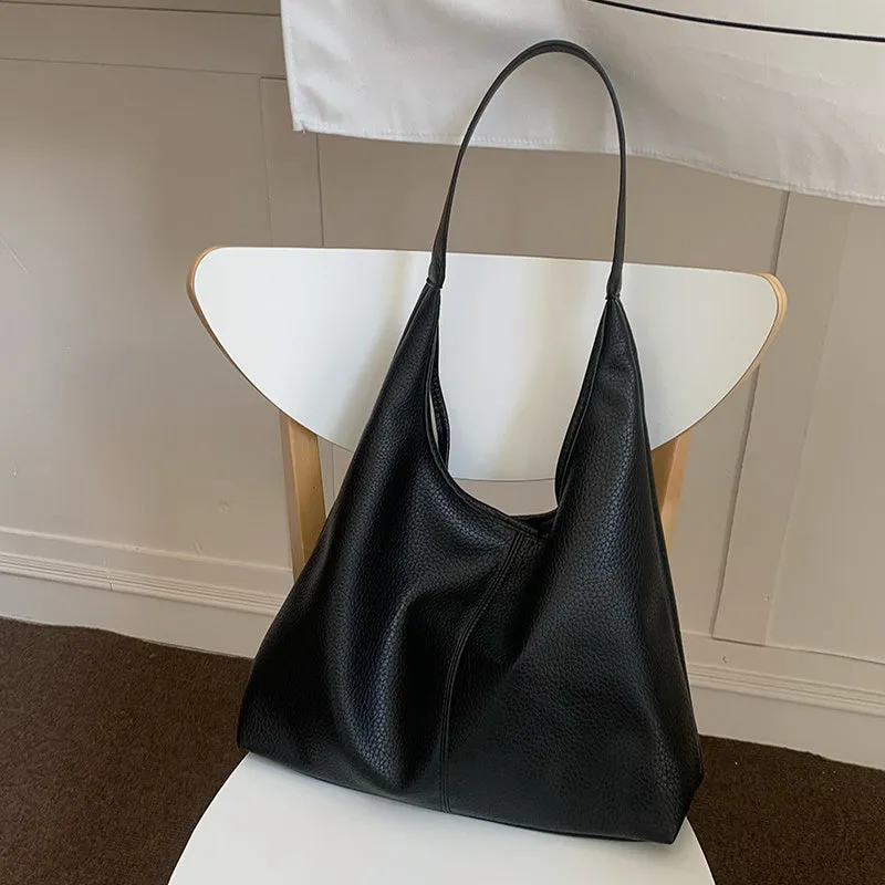 PU leather casual armpit bag for women, high capacity tote in black solid colour