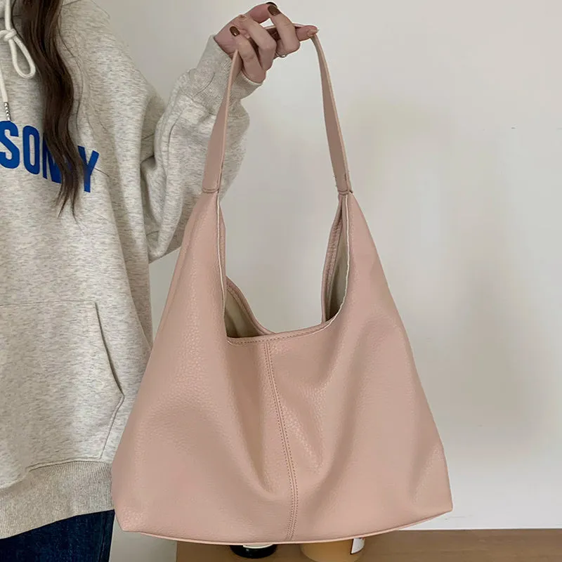 PU leather casual armpit bag for women, high capacity tote in black solid colour