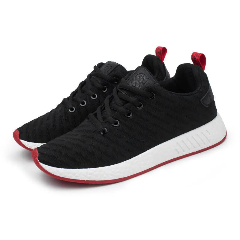 Men Malcolm Sneaker in black from side view showing mesh fabric upper and low-top design
