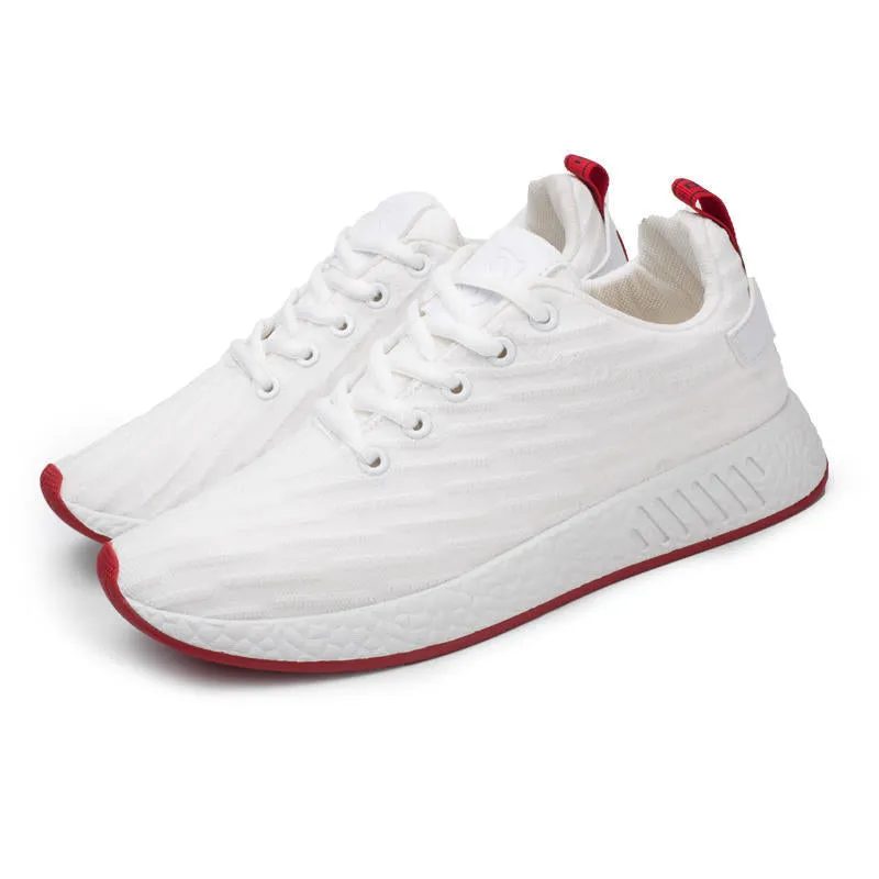 Men Malcolm Sneaker in black from side view showing mesh fabric upper and low-top design