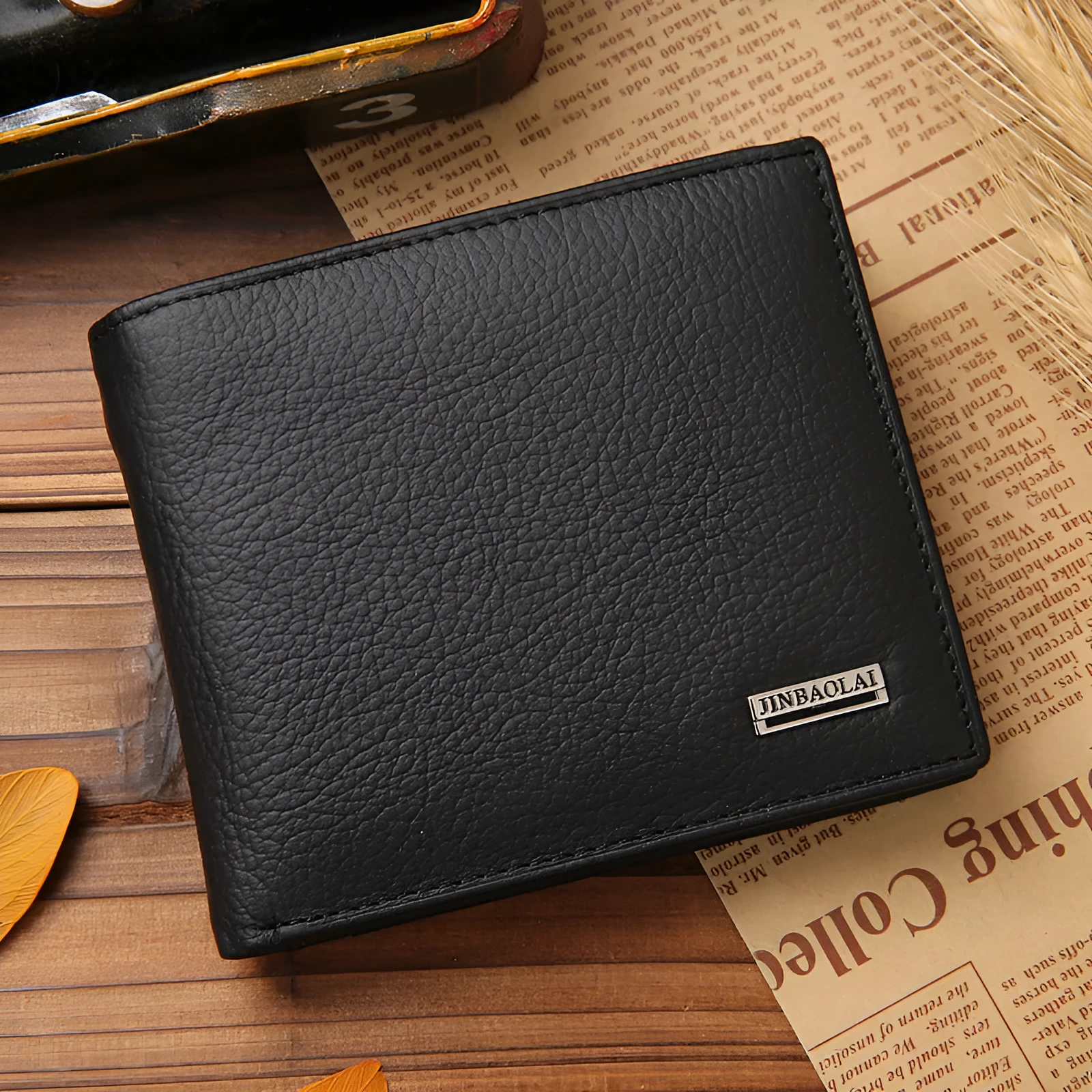 Men's black first-layer cowhide leather bifold wallet with stitching and coin purse measuring 11.5cm by 9.5cm