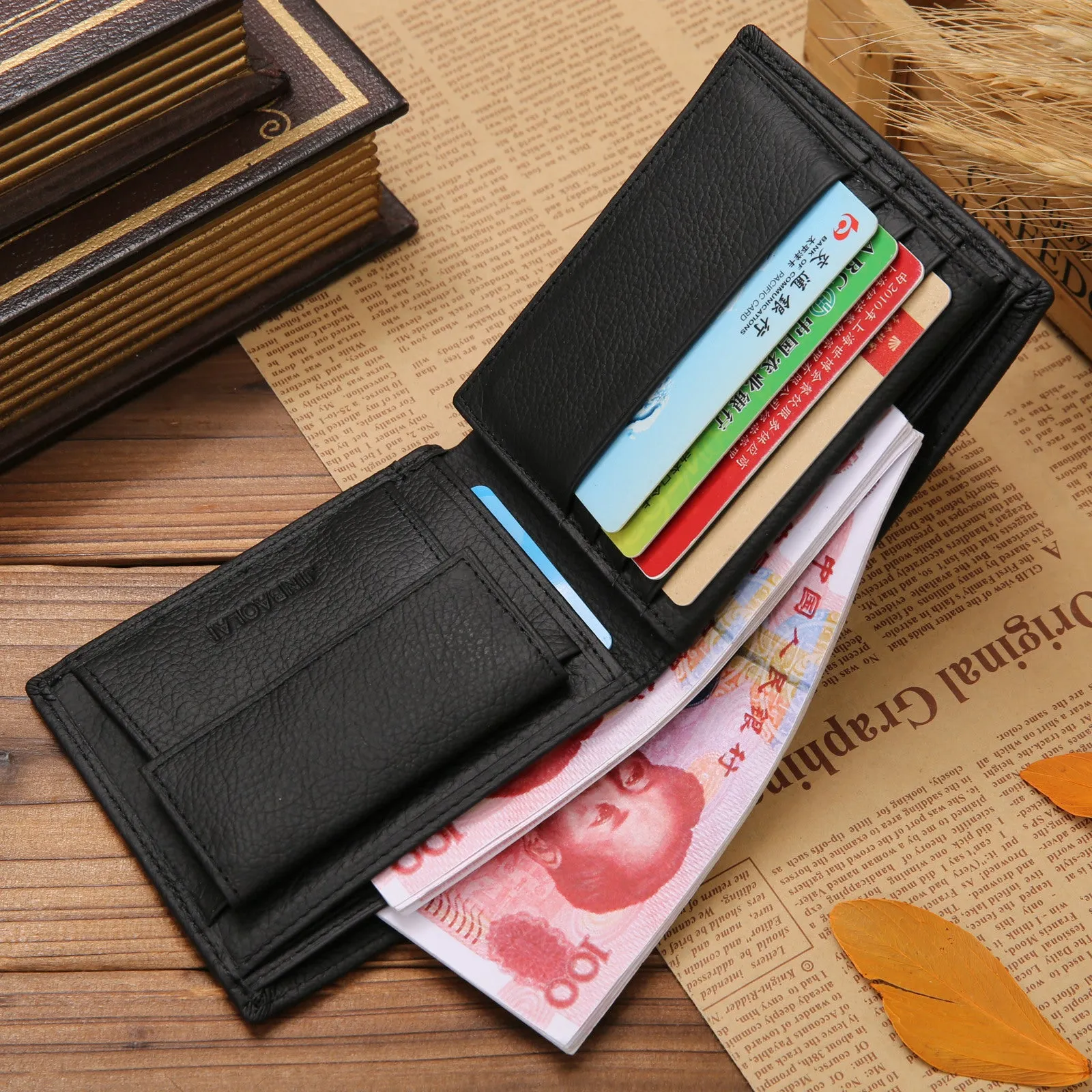 Men's black first-layer cowhide leather bifold wallet with stitching and coin purse measuring 11.5cm by 9.5cm