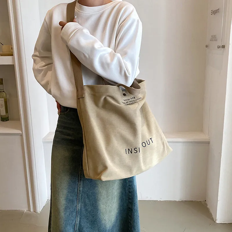 Large-capacity canvas tote bag with alphabet print and adjustable strap in coffee colour
