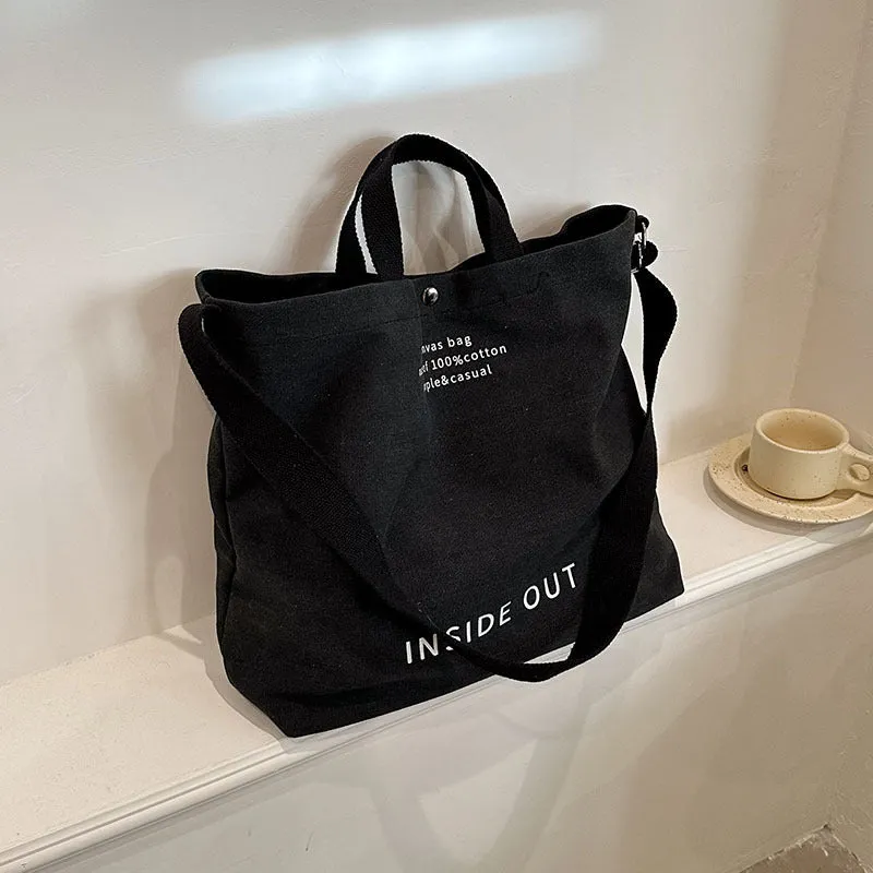 Large-capacity canvas tote bag with alphabet print and adjustable strap in coffee colour