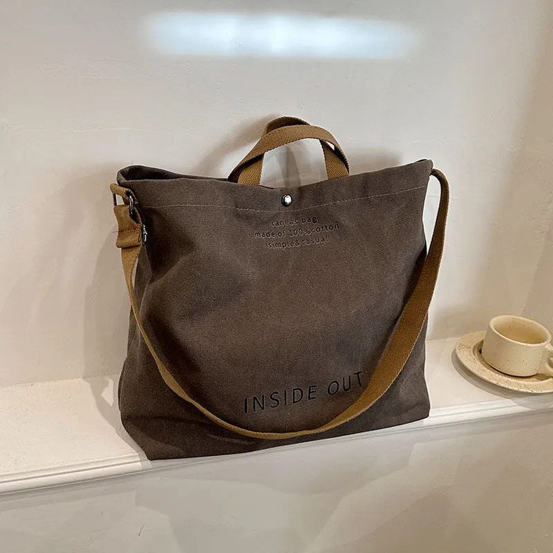 Large-capacity canvas tote bag with alphabet print and adjustable strap in coffee colour