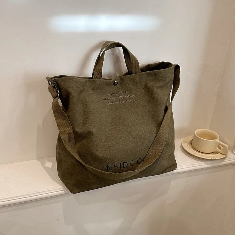 Large-capacity canvas tote bag with alphabet print and adjustable strap in coffee colour