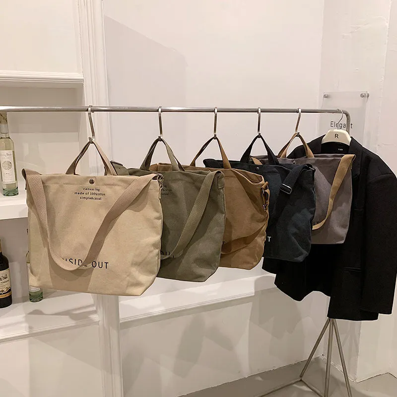 Large-capacity canvas tote bag with alphabet print and adjustable strap in coffee colour