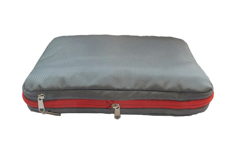 Waterproof nylon travel compression storage bag in cube shape, available in green, blue, black, and grey