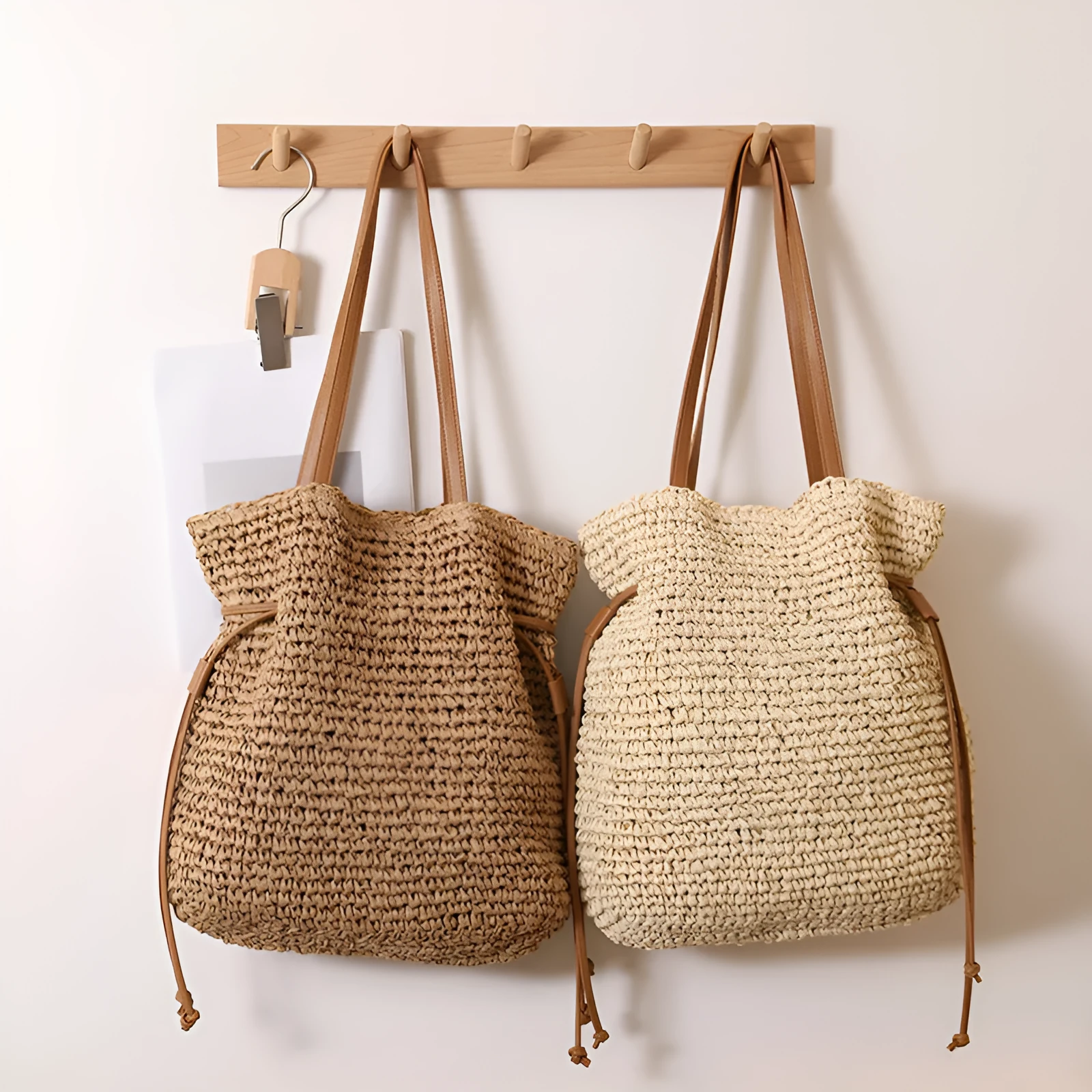 Large capacity paper straw drawstring shoulder bag in beige with double straps and inner pocket