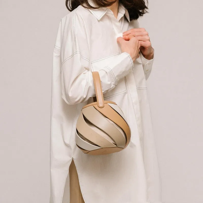 Cylindrical contrast stitching PU bucket bag in beige with diamond quilting and double shoulder strap