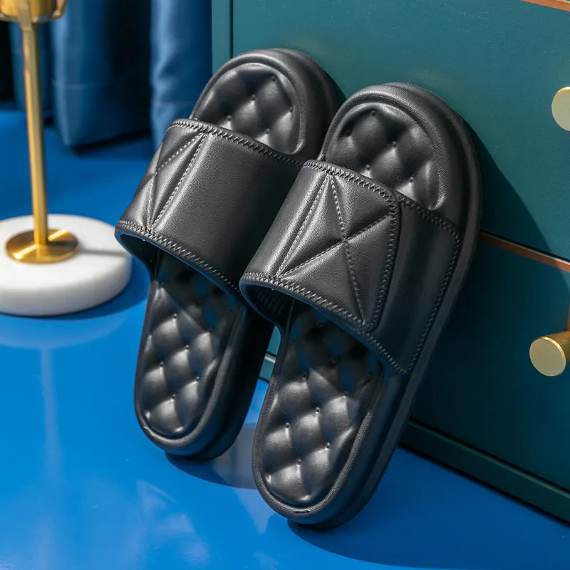 Pair of thick-sole EVA bathroom sandals in a chosen colour, showing soft upper and substantial non-slip base.
