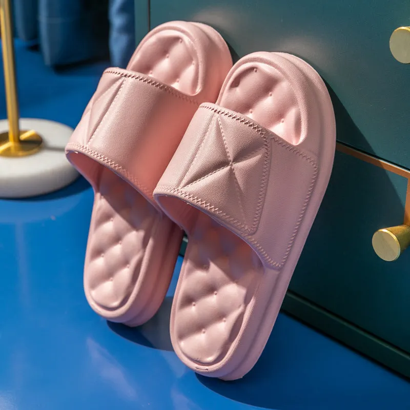 Pair of thick-sole EVA bathroom sandals in a chosen colour, showing soft upper and substantial non-slip base.