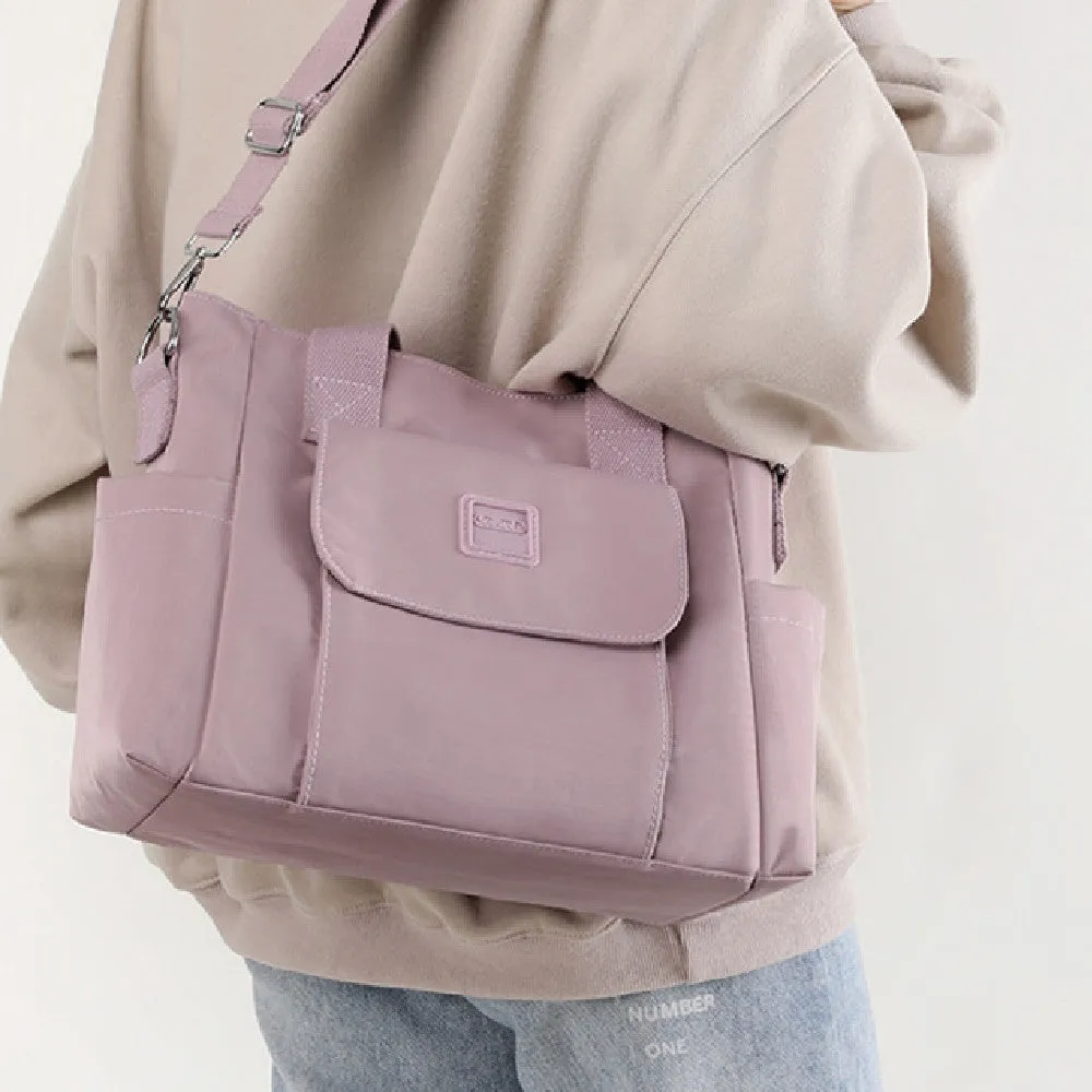 Women's large capacity multi-interlayer shoulder bag in nylon, soft horizontal square shape with sewing line detail, multiple internal compartments, urban simplicity style