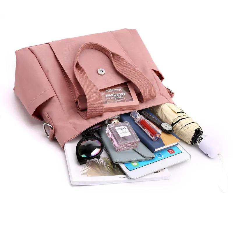 Women's large capacity multi-interlayer shoulder bag in nylon, soft horizontal square shape with sewing line detail, multiple internal compartments, urban simplicity style