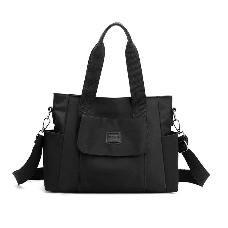 Women's large capacity multi-interlayer shoulder bag in nylon, soft horizontal square shape with sewing line detail, multiple internal compartments, urban simplicity style