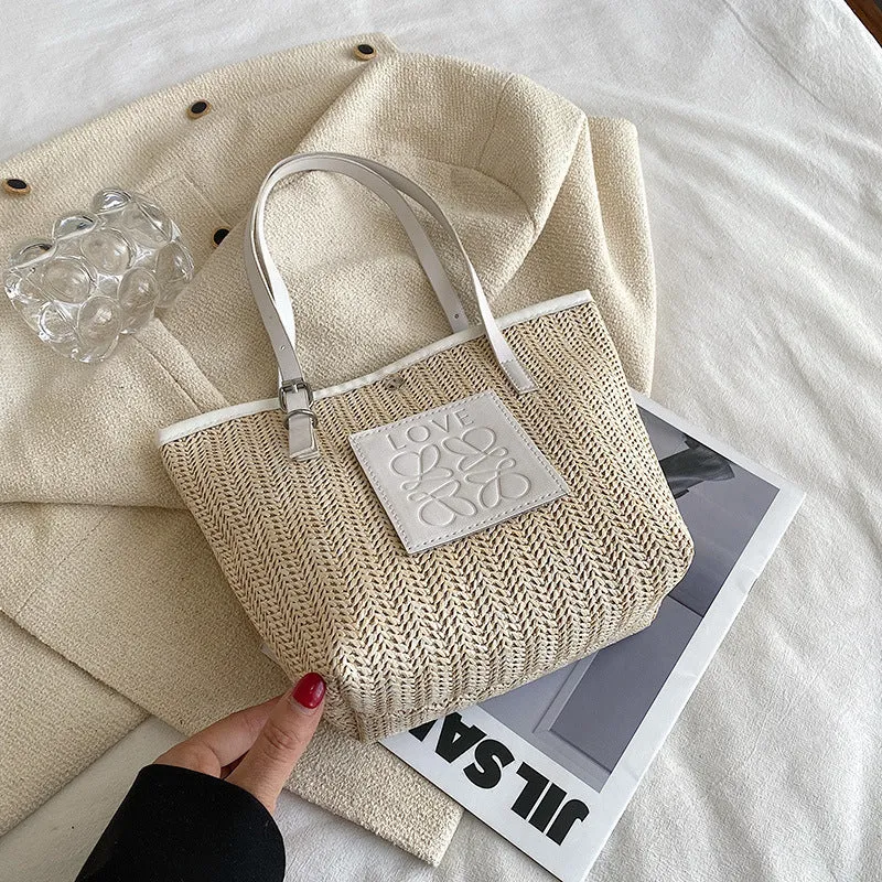 Straw woven women's shoulder bag with horizontal square shape and three-dimensional pocket