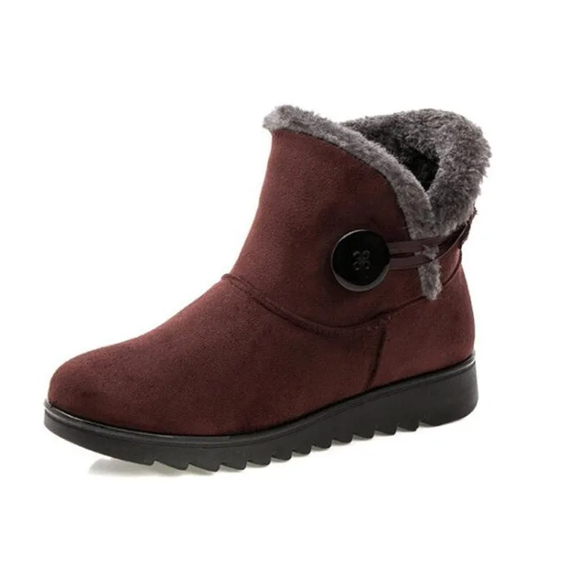 Women's winter flock ankle snow boots with button closure, rubber sole, and low platform in solid colour