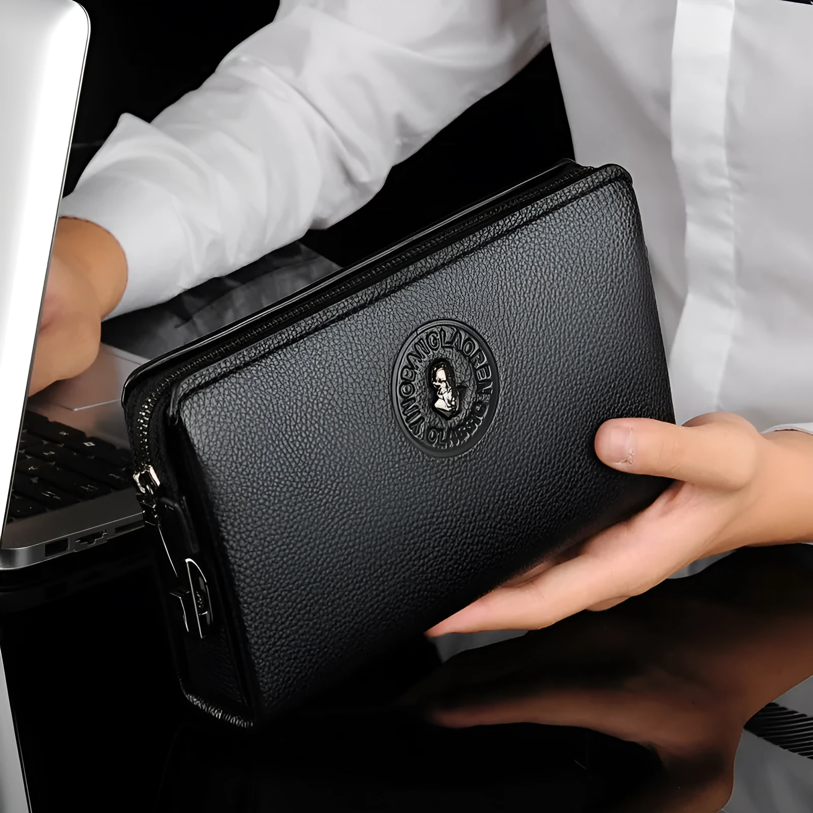 Men's business casual clutch made of soft PU leather, black, with visible sewing line detail and anti-theft design