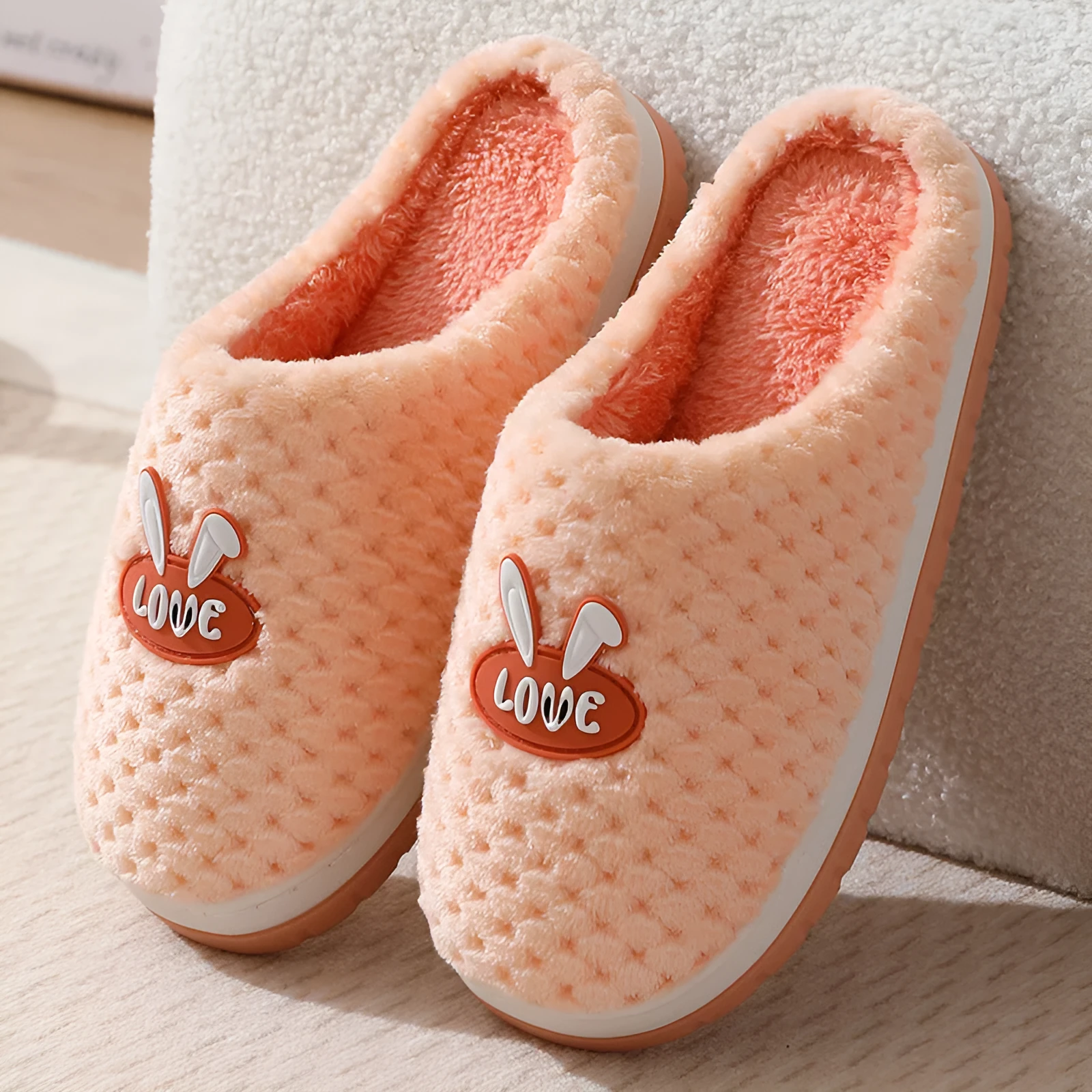 Women's plush rabbit plaid design house slippers with artificial fur and a light brown anti-slip rubber sole.