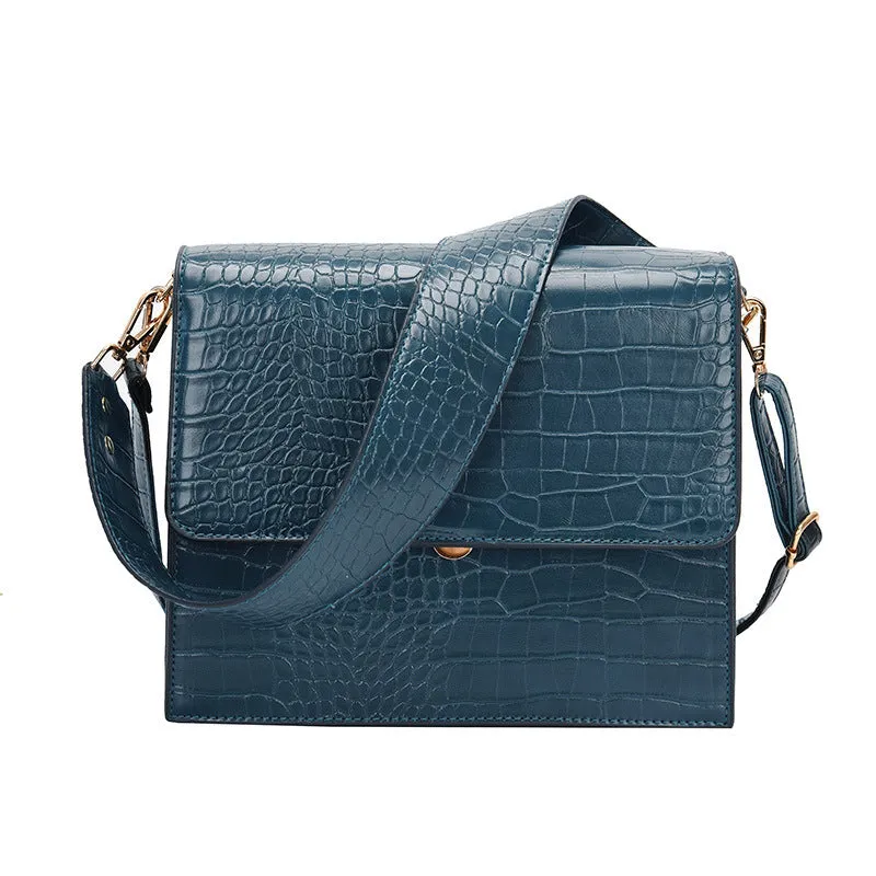 Stone pattern small square PU shoulder bag with flap closure and double straps, shown in blue, black, bronze, and yellow colour options
