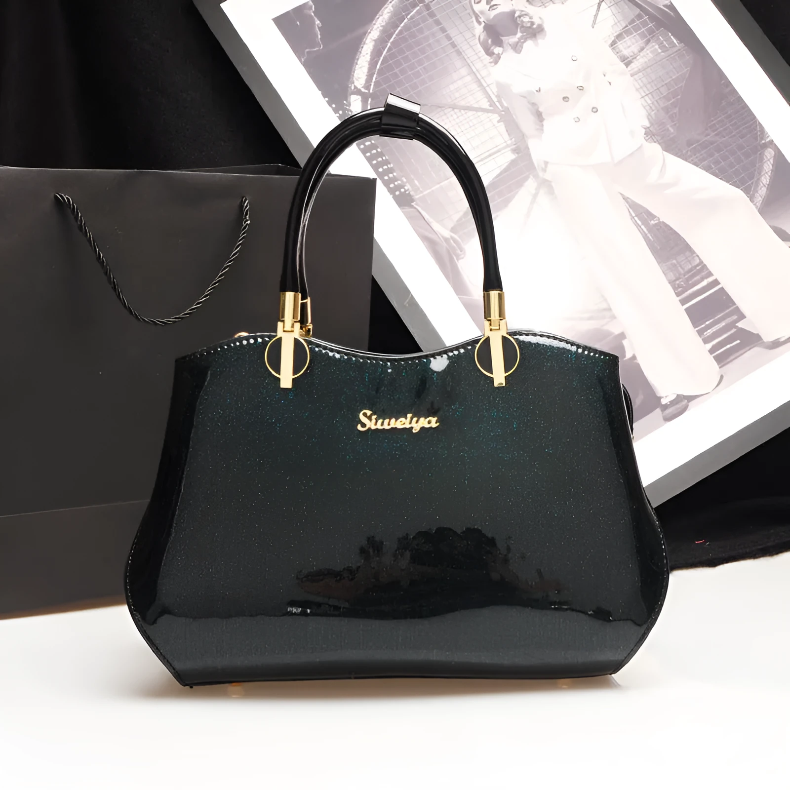 Women's medium horizontal square handbag with zipper closure and printed design, available in multiple colour options