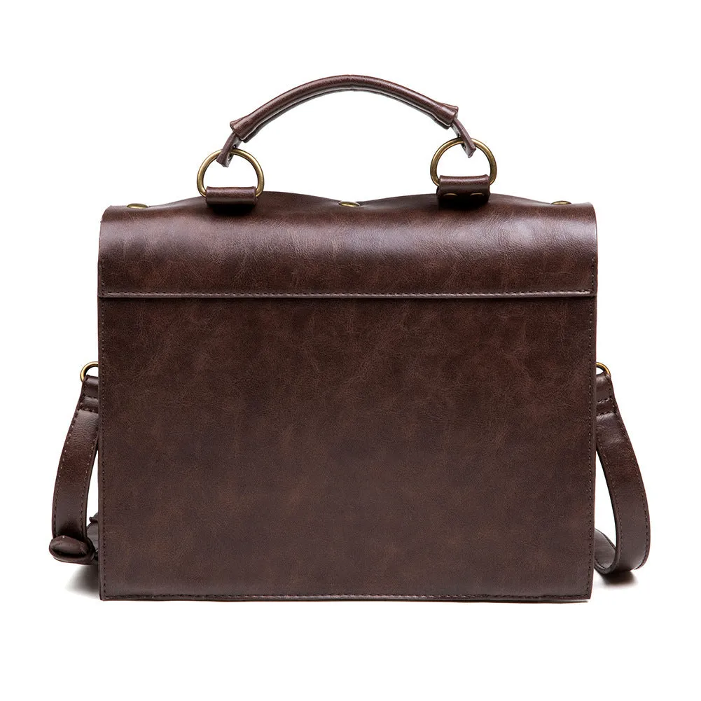 Bronze steampunk shoulder bag with metal hardware and horizontal square pillow design