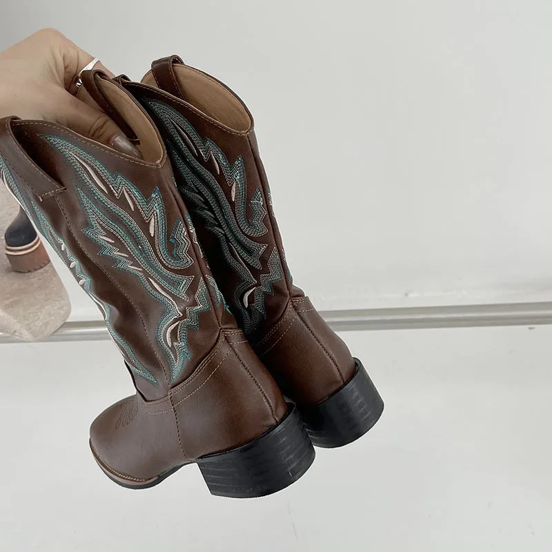 Brown embroidered women's mid-calf Martin boots with a square heel on a white background.