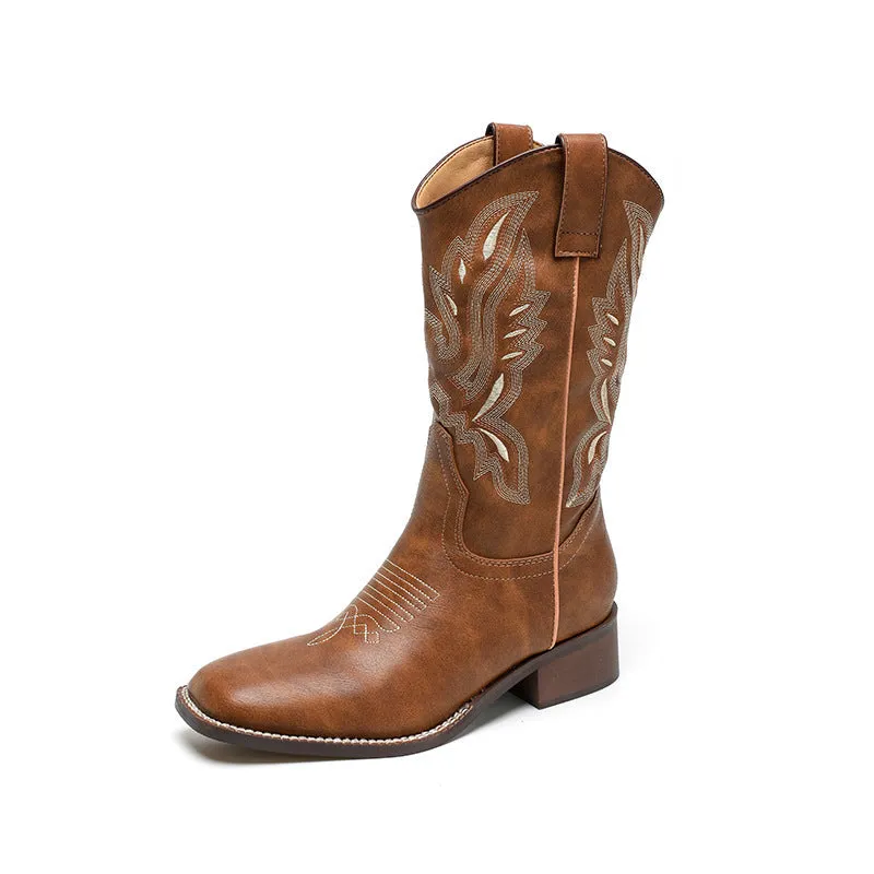 Brown embroidered women's mid-calf Martin boots with a square heel on a white background.