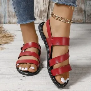 Fashion round toe beige Roman women's sandals with PU upper and rubber sole on a neutral background