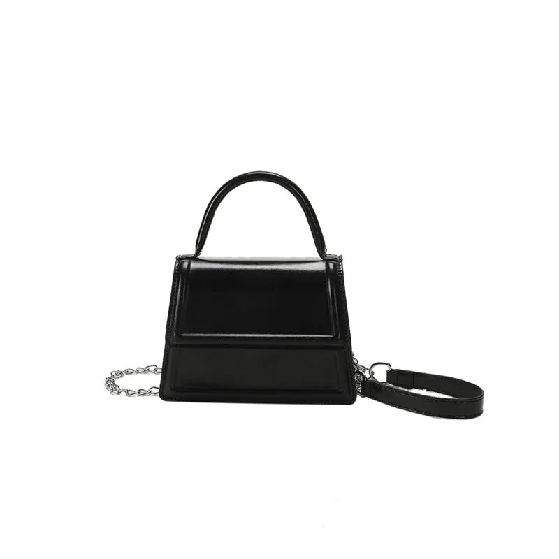 Retro PU leather shoulder bag in horizontal square shape with crossbody strap