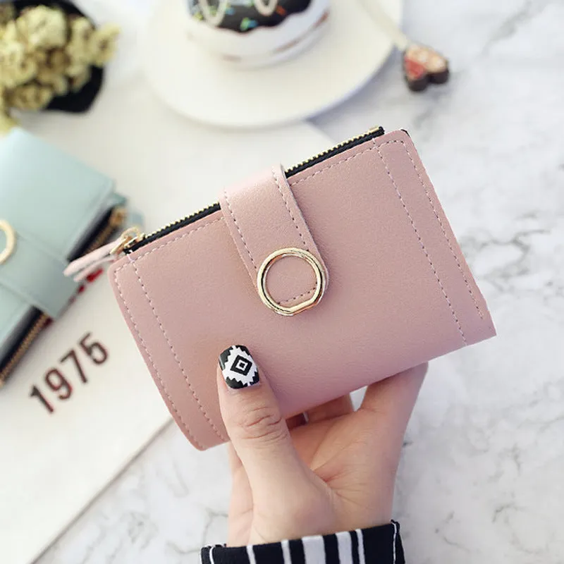 Women's PU leather buckle ring wallet in compact 12x9cm size with card slots and coin section.