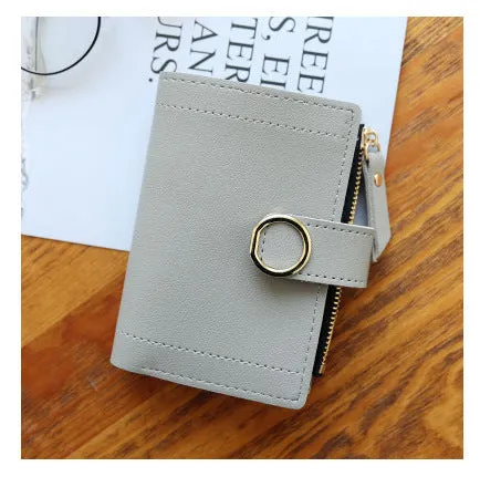 Women's PU leather buckle ring wallet in compact 12x9cm size with card slots and coin section.