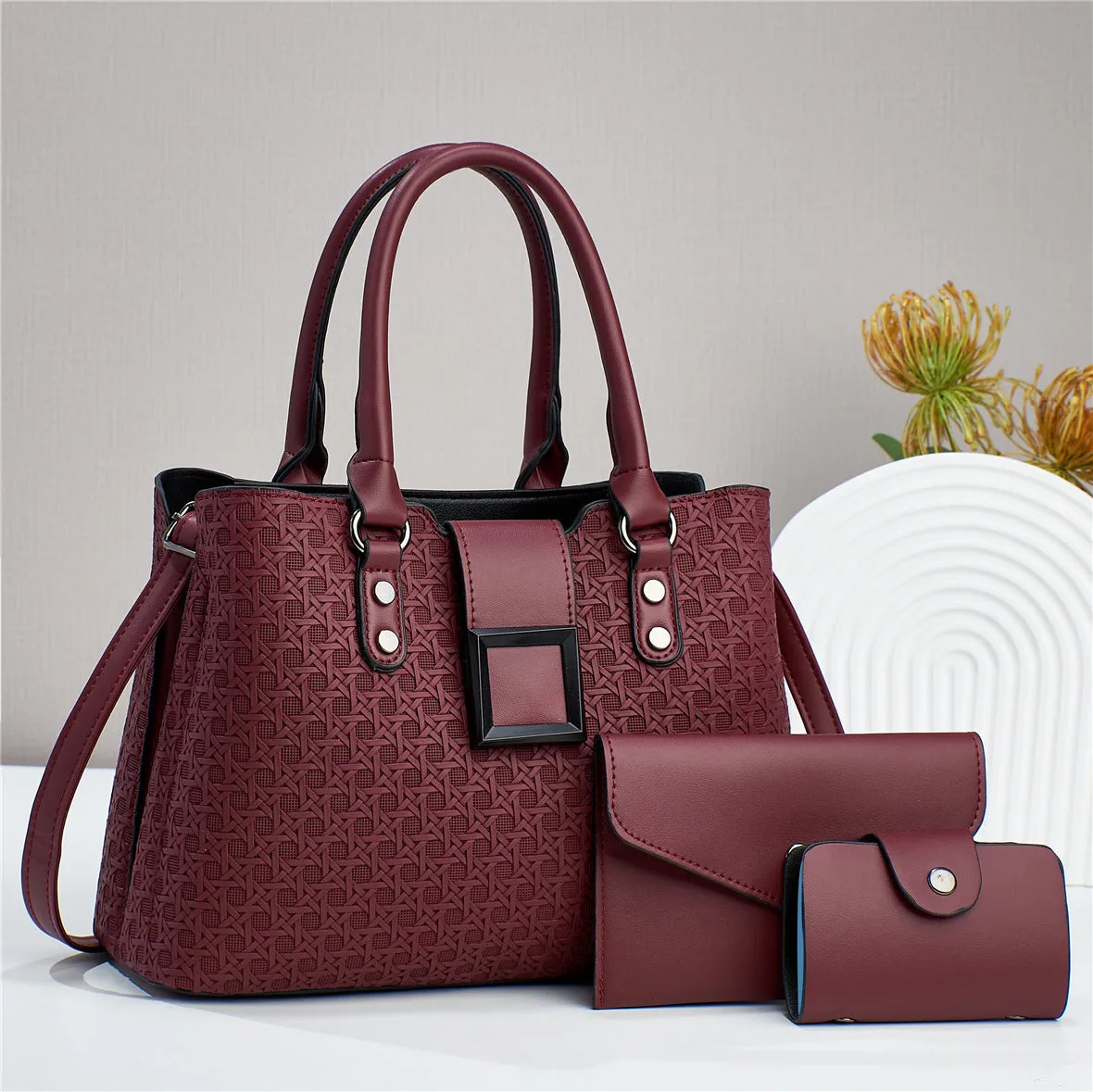 Three-piece textured women's crossbody bag in square vertical shape with weaving detail and single shoulder strap